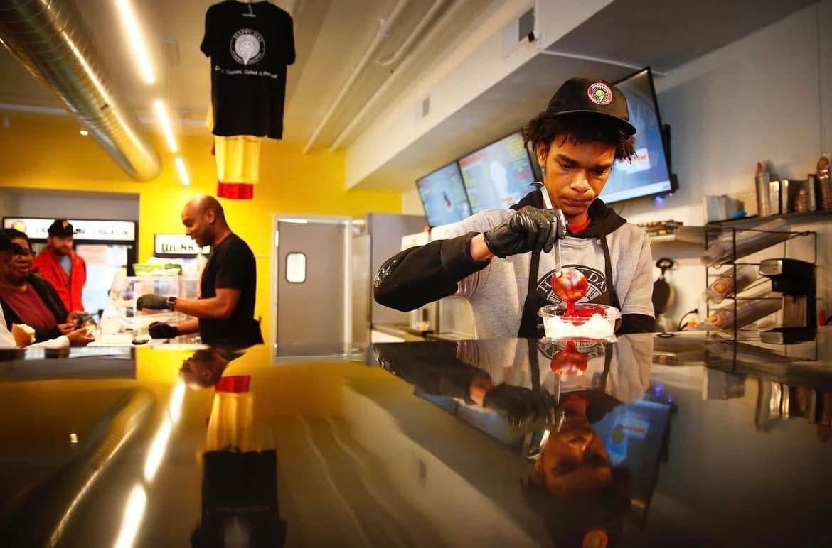 Happy Day Dessert Factory staff serving ice cream at the counter