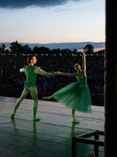 Pittsburgh Ballet Theatre dancers leaping at Ballet Under the Stars at Hartwood Acres