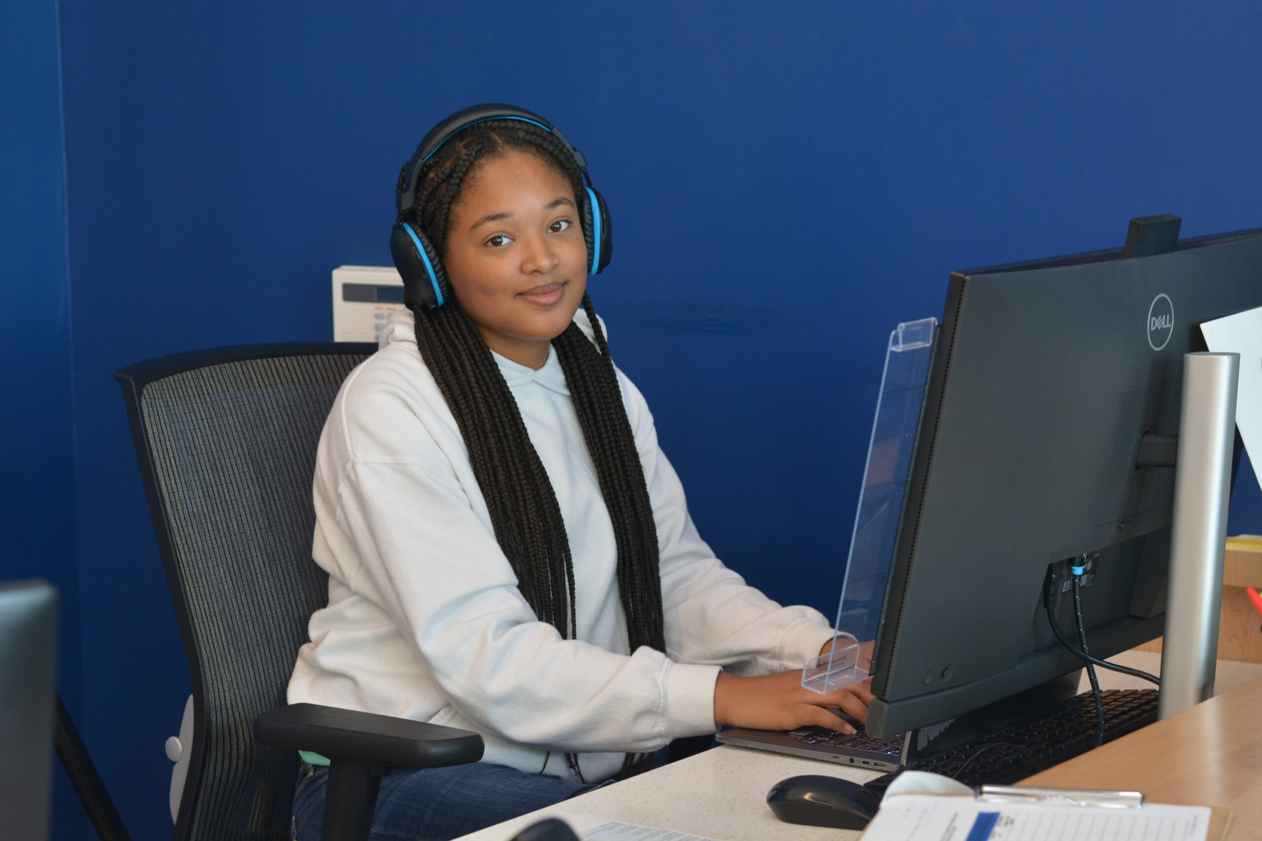 Student at computer workstation at Homewood Children's Village