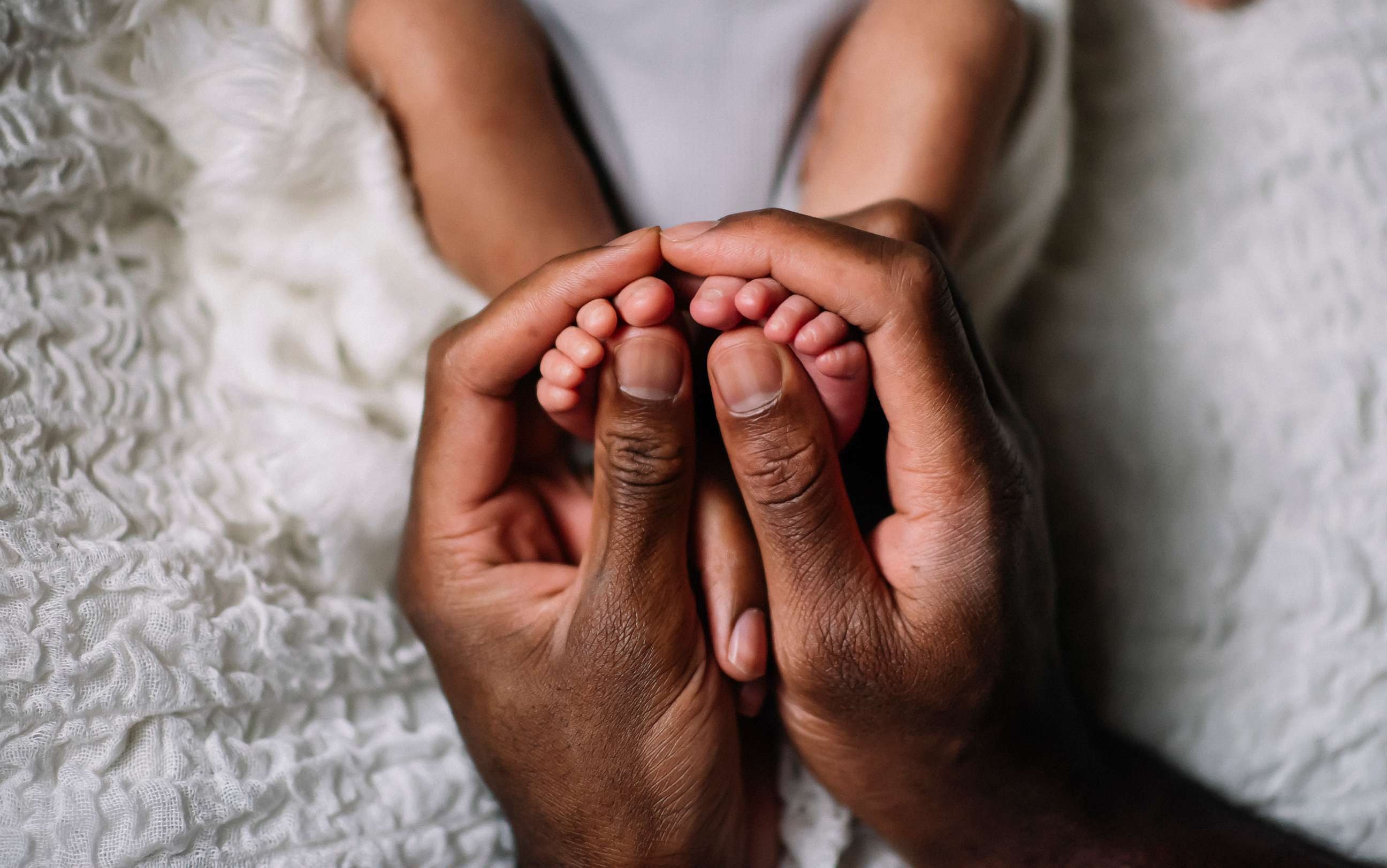 Newborn baby sleeping safely in crib — Allegheny County infant safe sleep campaign