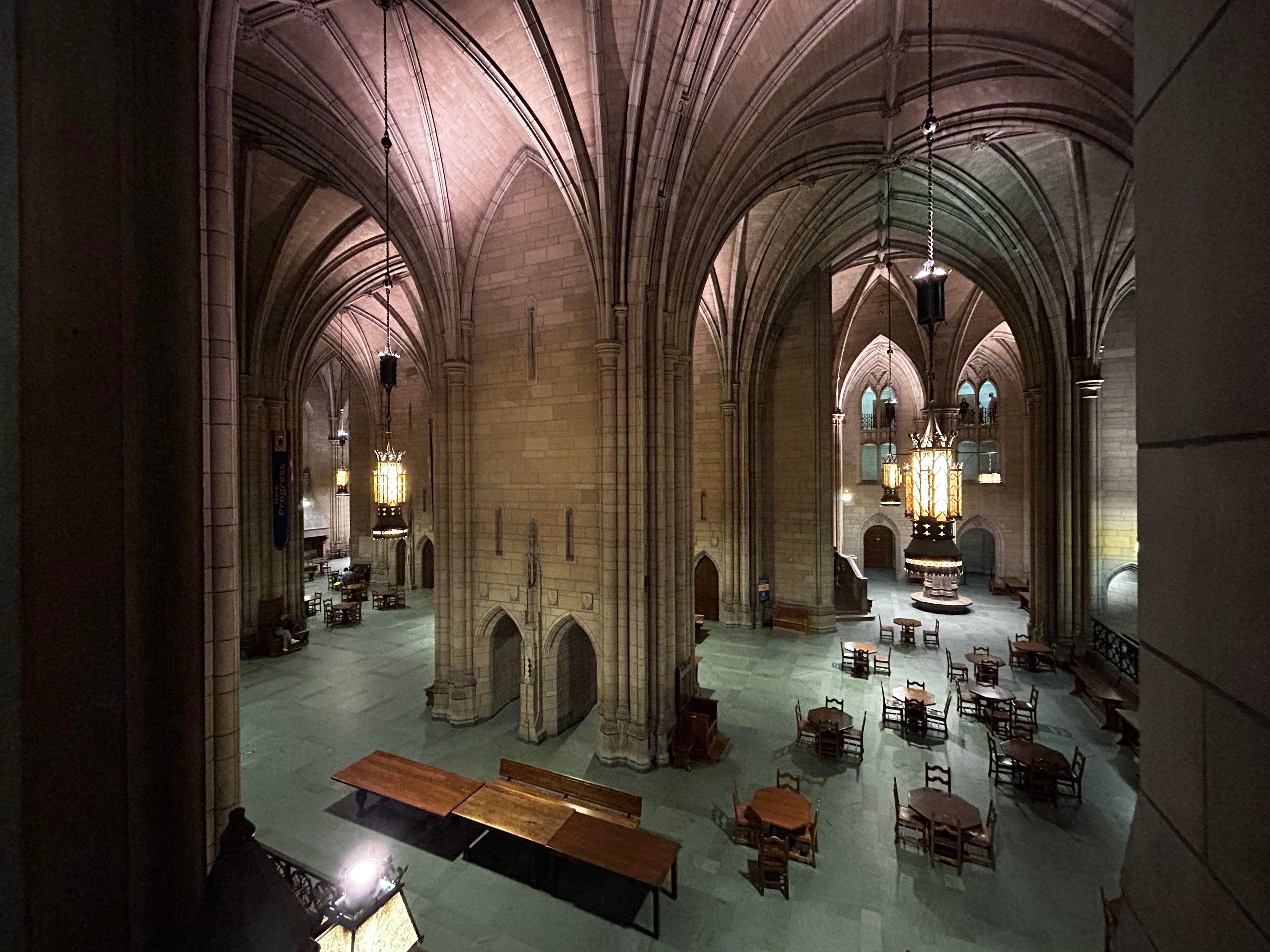 The Commons Room of the Cathedral of Learning — empty, Gothic arches and lanterns